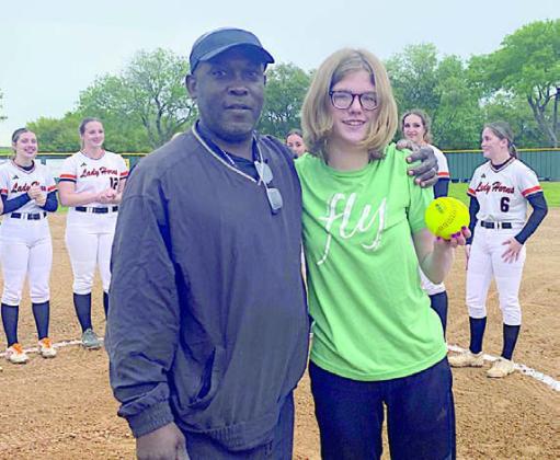 Turtle Wing Games get under way – Emma Kubala (right) threw out the first pitch at the Schulenburg Lady Horn softball game on Tuesday, March 19 during the school’s Turtle Wing Game. It was the first Turtle Wing Game of the season and Kubala’s pitch was a strike! Kubala is shown with Schulenburg High Head Softball Coach Gilbert Price (left).