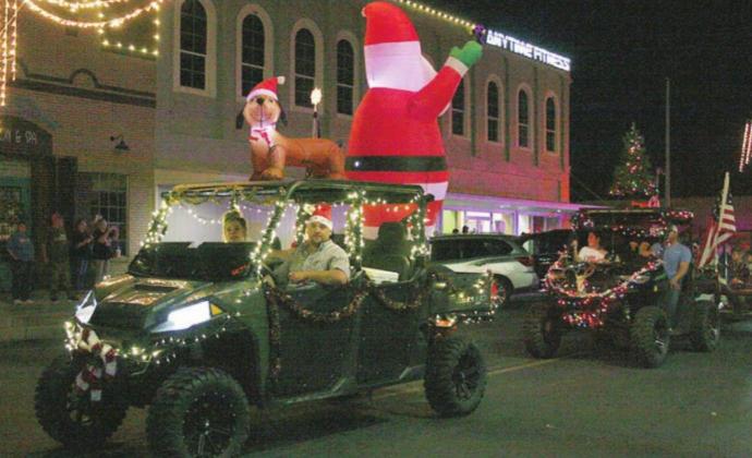 Santa &amp; Mrs. Claus come to town for Chamber parade