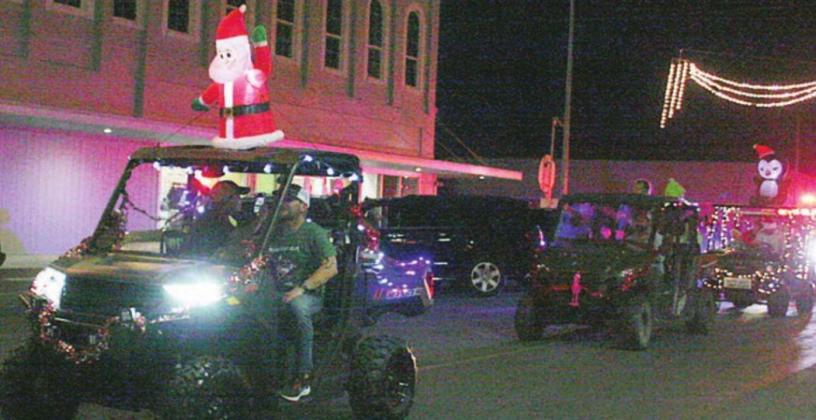 Santa &amp; Mrs. Claus come to town for Chamber parade