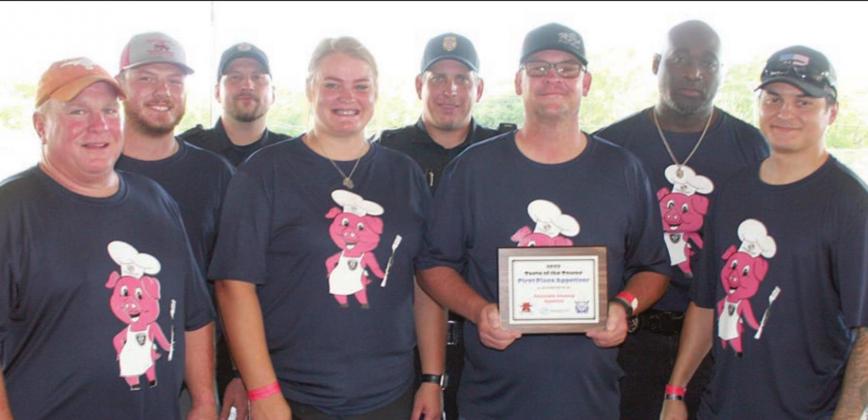 First Place Appetizer – Schulenburg Police Department Team members were: (front, from left) Rusty Roggenkamp, Hailee Vincent, Troy Brenek, Juan Castilleja; (back, from left) Caleb Geissen, Jacob Mills, Tobey McFadden, Frank Parkinson, and (not shown) Betty Shimek. Sticker Photo By Darrell Vyvjala