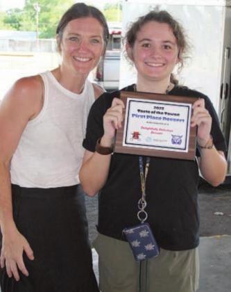 First Place Dessert – Jack and Mary’s of Schulenburg Erin Wotipka (left) and Mary Wellborn accept the award. Sticker Photo By Darrell Vyvjala
