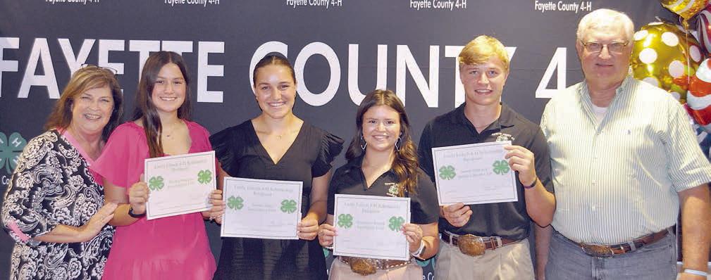 eMily FritSCH 4-H SCHolarSHiP – (from left) presenter Mrs. Phylis Fritsch; recipients Rachel Matocha, Tamara Otto, Mackenzie Poncik and Austin Nedbalek; presenter Lee Fritsch; and (not shown) Raygen Pyle.