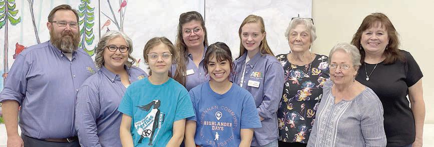 Helping with last Friday’s Summer Reading Program at the Schulenburg Public Library were: (front, from left) library volunteers Emily Pesl and Ana Avila, Friends of the Library member Patricia Rowton; (back, from left) Arts for Rural Texas Events Director Kevin White, ARTS Programs Director Cynthia Fogleman, Tory Farley and Faith Hanacek with ARTS, Friends member Mary Zeller, and librarian Donna Holub. Sticker Photo By Darrell Vyvjala