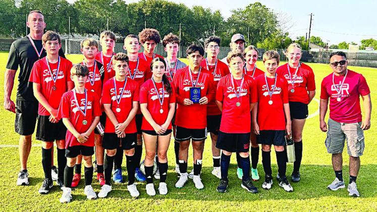 SOCCER – St. Rose fielded its second soccer team this year, playing three games and placing second at the Diocese of Victoria Athletic League Tournament. Making up the team were: (front, from left) Barett Redman, Cal Schiffli, Elly Wotipka, Max Hernandez, Will Herzik, Justin Schramek, coach Juan Hernandez; (back, from left) coach Shannon Hollas, Jacob Schramek, Brett Hollas, Bryson Ohnheiser, William Eudy, Denver Carr, Charlie Shank, Chris Campos, coach Matt Bonner, Miranda Bonner, and Ashtyn Schaefer.