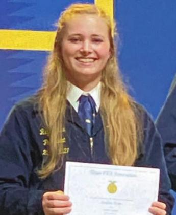 YOUNG FARMERS Scholarship – Regan Lux (right) was awarded the $1,000 Texas Young Farmers Billy Harrel Scholarship.