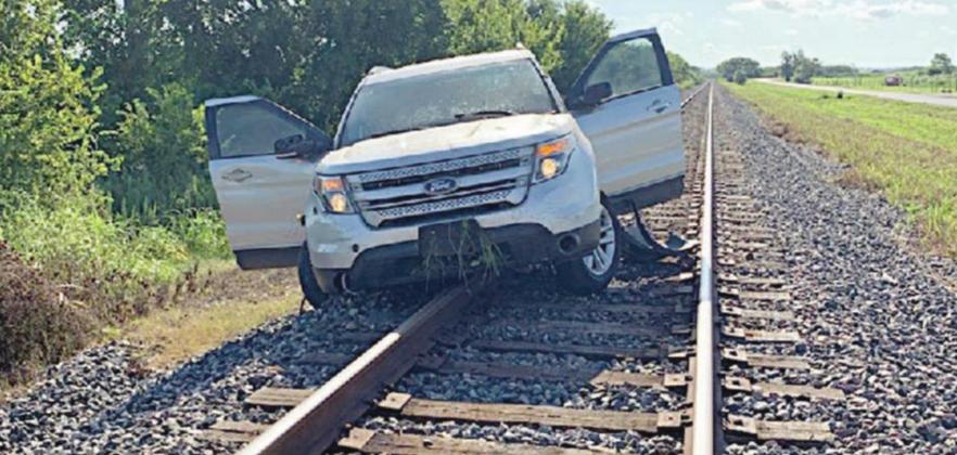 Chase through town ends on tracks