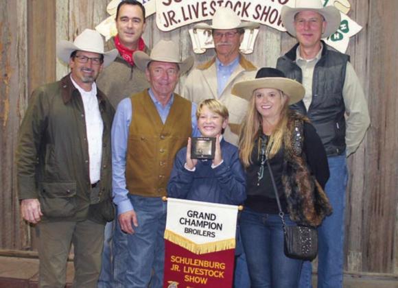 BROILERS – Exhibitor: Joseph L. Schindler III (front, holding banner).