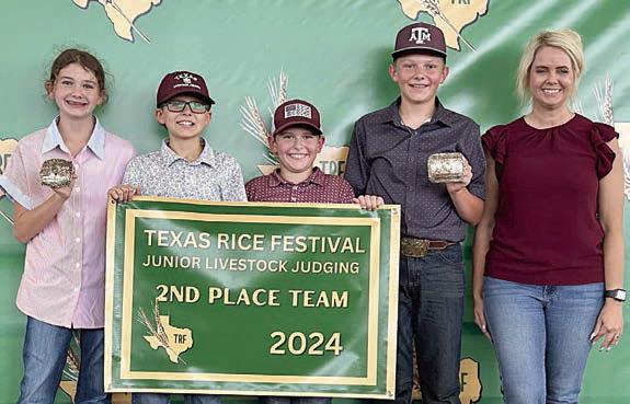Reserve Champion Junior Team – (from left) Laramie Laake, Tate Fritsch, Hudson Holub, Holden Holub and coach Kaci Carrales. Hudson Holub and Holden Holub are Schulenburg 4-H’ers.
