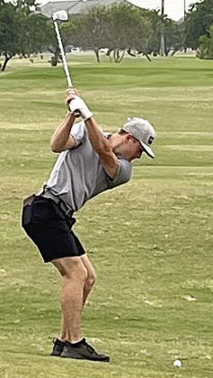 Reid Janda swing back to hit an approach shot at the regional tournament in Corpus Christi.