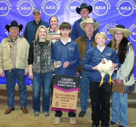 GRAND CHAMPION MARKET BROILERS – Exhibitor: Joseph L. Schindler III (front, right). Sales price: $5,500. Sticker Photo By Darrell Vyvjala