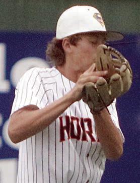 Second baseman Brayden Stoever gloves a high-hopper off the turf in game two. Sticker Photo By Darrell Vyvjala