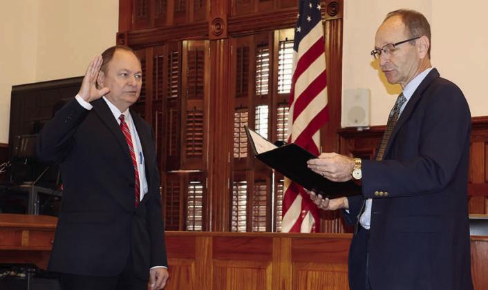 Mueller sworn in as Fayette County judge