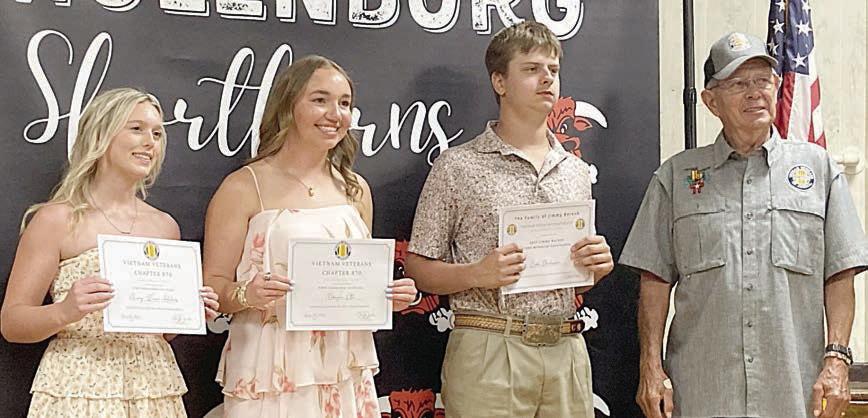 Schulenburg High School seniors receiving scholarships from VVA Chapter 870 were (from left) Avery Helms and Mikayla Otto, Chapter 870 scholarships; and Cade Ohnheiser, Jimmy Baresh Memorial Scholarship. Presenter was Eugene Krupala (right), scholarship committee member.