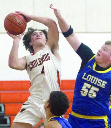 Jayse Janda hits a shot and gets fouled in the first quarter Friday. Sticker Photo By Darrell Vyvjala