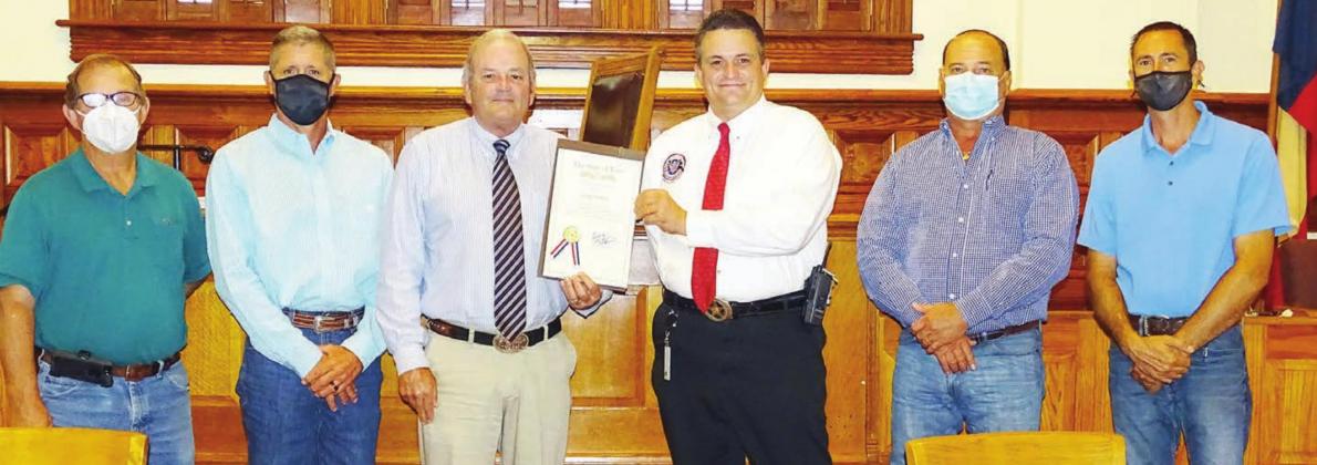 Certificate of recognition presented to Moreau