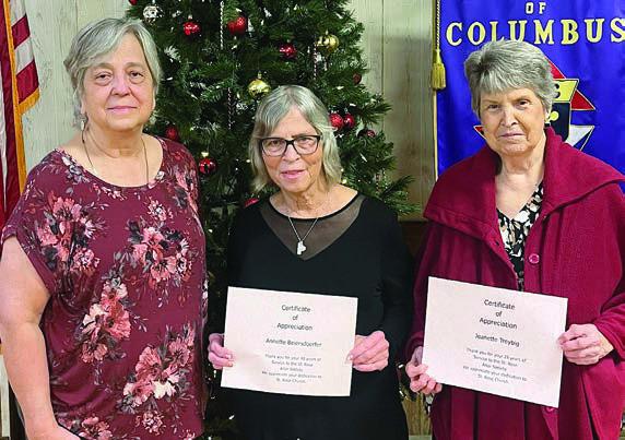 The St. Rose Altar Society gave out service awards at the Christmas party in December. Shown are Debbie Behlen, 40 years; Annette Beiersdorfer, 40 years; and Jeanette Treybig, 25 years. Recipients not shown are as follows: 60 years – Julia Krischke; 45 years – Linda Veselka; 40 years – Mary Ann Demel, Angie Schwenke and Laurie Trench; 30 years – Sandra Warnken; 25 years – Carol Ohnheiser, Jeanette Treybig and Linda Wagner; and 15 years – Connie Florus, Karey Ann Kalich and Barbara Lesikar.