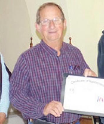 FROM THE DEC. 31 ISSUE – Tom Muras was presented a certificate of appreciation by the Commissioners Court for serving as Precinct 4 commissioner for 30 years.
