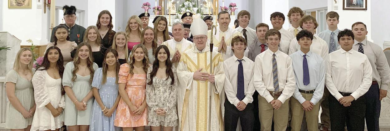 sacrament of confirmation administered at st. Rose Catholic Church