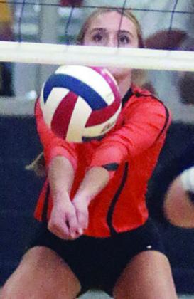 Miranda Bonner picked up a dig in the back row during the second set against Giddings. Sticker Photo By Darrell Vyvjala