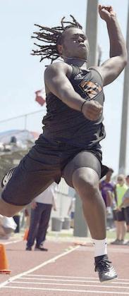 Rodney H Walton springs to a thirdplace finish in the triple jump. Photo By Melanie Berger / Courtesy of Flatonia Argus