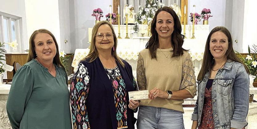 hsa gives $110,000 to st. Rose school