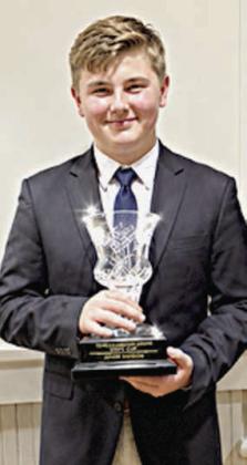 Abraham McBride earned the Texas Junior Cup trophy in livestock judging.