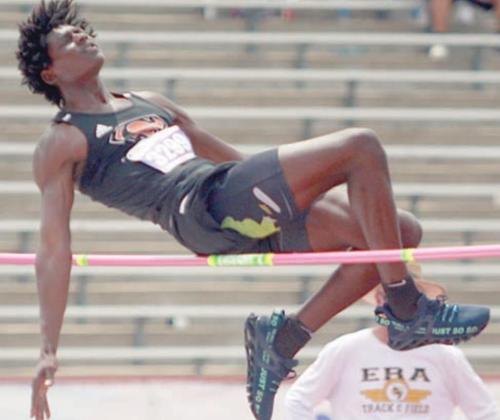 Keanu Anthony grazes the bar but gets over 6-feet at the state meet on his second. Sticker Photo By Darrell Vyvjala