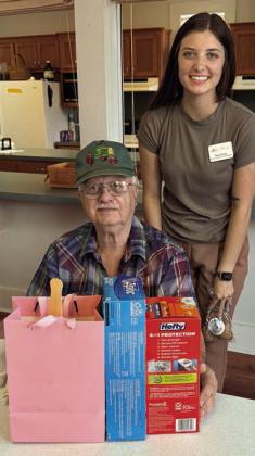 Having quite th e winn ing str eak at bingo recently was August Kalinec (left), shown with Kayley Yancey (right) from Flatonia Heathcare Center, who called the blackout game he won!