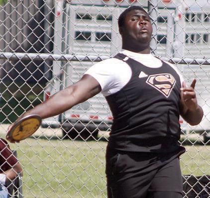Tavondrick Ellison releases a 120-foot throw to place fifth in the discus. Sticker Photo By Darrell Vyvjala