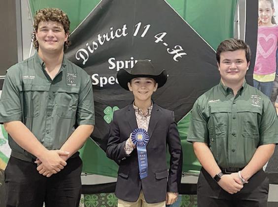 Public Speaking 1st place – Crockett Guenther (center), shown with Cooper Green (left) and Logan Poncik (right), District 11 4-H officers.