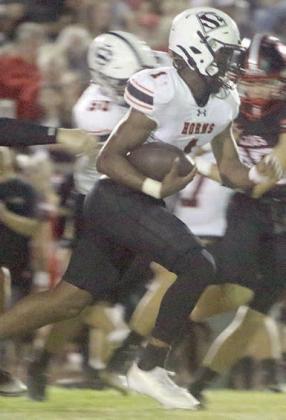 DaTerrion Houston sprints upfield for a 51-yard touchdown run to start the third quarter. Sticker Photo By Darrell Vyvjala