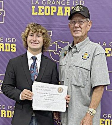 Cody Krupala (left), a La Grange High academic excellence awards recipient, was recently awarded a $1,000 scholarship from American Legion Post 143 in Schulenburg. Cody’s grandfather, Legion Post 143 member Eugene Krupala (right), made the presentation on Thursday, May 9 at the La Grange High scholarship recognition program. Cody will attend A&amp;amp;M University at Kingsville and major in range and wildlife management.