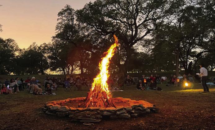 Around sunset on Friday, Oct. 27, eerie but entertaining stories will be told at Monument Hill &amp;amp; Kreische Brewery State Historic Sites. The photo shows a previous presentation as the audience heard the tales with a campfire as a backdrop.