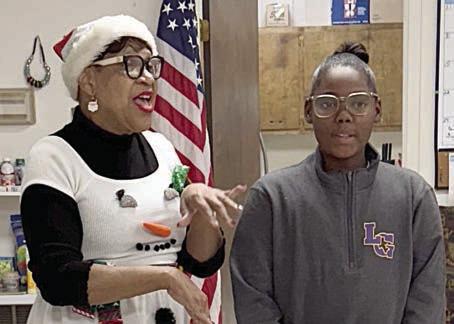 A ‘snowman elf’ dropped by Senior Connections over the holidays to spread some Christmas cheer. Virginia Berry brought gift bags of goodies for the members and sang carols with the help of Alfreda Ellisons’s grandaughter, Reygan Hutchson.