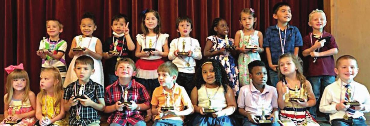 GRADUATES – (front row, from left) Bessie Sassin, Gabriella Kallus, Maxmilian Sanchez, Sebastian Villanueva, Greyson Konency, Celsey Thompson, Caleb Kirby, Sadie Davis, Adam Reeves, (back row) Eli Bogle, Anahi Resendiz, Gabriel Espino, Catherine Balderas, Brandon Camacho, D’Ariah Moore, Evelyn Wharton, Juan Carlos Luna Jr., Carter Ahrens, (not shown) Bowen Banse, Emily Herzik, Esabella Juarez and Jentry Schmicek.