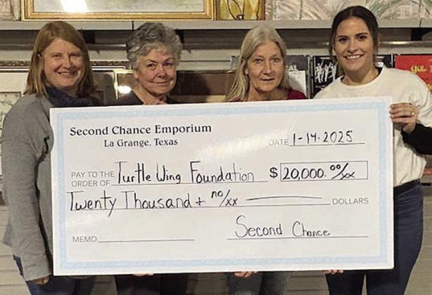 Turtle Wing Fo und ation Chec k Presen ation – (from left) Marlene Schnell, SCE assistant store director; Darlene Strahan, SCE assistant store director; Gayle Schielack, SCE store director; and Destiny Siptak, Turtle Wing Foundation executive director.