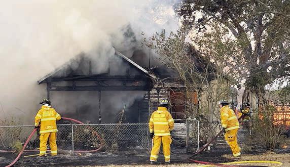 Round Top -Warr ento n firefight ers , along with firefighters from three other departments, worked the house fire on Monday, Oct. 13. Photo Courtesy of Fayette County Sheriff's Office