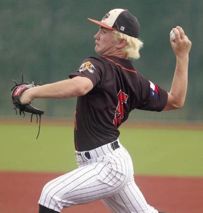 Brycen Schramek delivers a strikeout pitch to get out of a bases-loaded jam in the bottom of the second inning Saturday. Sticker Photo By Darrell Vyvjala