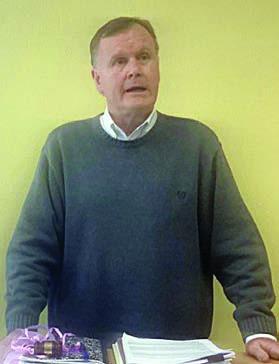 Mark Elv ig, candidate for Fayette County attorney, spoke to the group about himself and his campaign for the office.