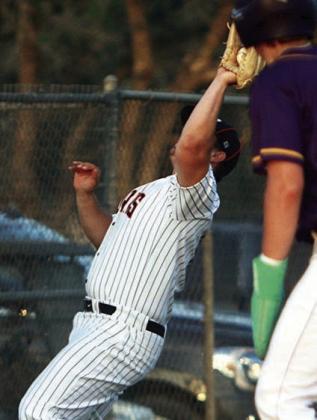Third baseman Tyson Wagner gloves a Comanche popup in foul territory. Sticker Photo By Darrell Vyvjala