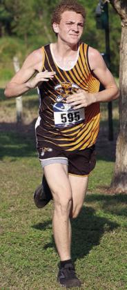 Alton Herzik runs to a third-place finish in Moulton. Photo By Melanie Berger / Courtesy of Flatonia Argus