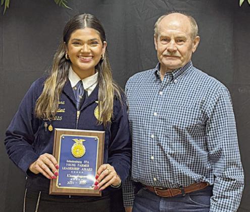 Young FarmerS Leadership Award – (from left) recipient Klare Segura; and presenter Mark Vecera.