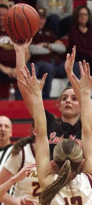 Miranda Bonner hits a shot in the lane in the first quarter. Sticker Photo By Darrell Vyvjala