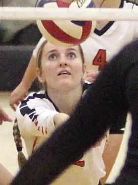 Madison Kunschick gets a dig against Skidmore-Tynan. Sticker Photo By Darrell Vyvjala