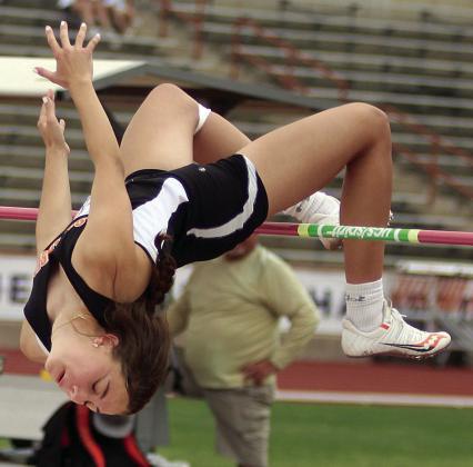 WINNING LEAP – Meredith Magliolo clears 5-feet, 5-inches on her second attempt Friday morning during the UIL’s State Track &amp;amp; Field Championships to secure the Class 2A gold medal in the high jump. Sticker Photo By Darrell Vyvjala