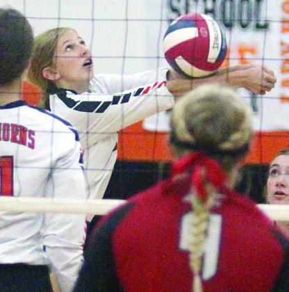 Clara Magliolo digs a Lady Panther attack in game two on Aug. 22. Sticker Photo By Darrell Vyvjala