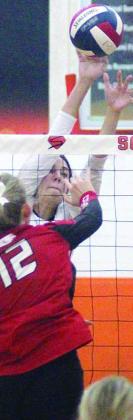 Meredith Magliolo deflects an attack in the first set last Tuesday. Sticker Photo By Darrell Vyvjala