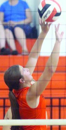 Setter Landry Zapalac tips a ball over in Friday’s scrimmage against Hallettsville. Sticker Photo By Darrell Vyvjala