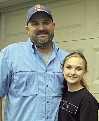 First place winner Brylee Brugger from La  Grange ISD with her father Chris Brugger