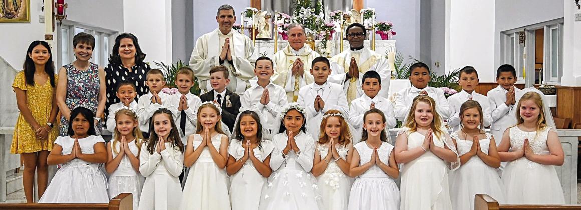 Students receive First Holy Communion at St. Rose Parish